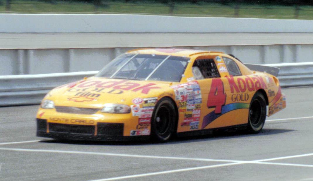 Sterling Marlin's yellow No. 4 Kodak Gold Chevrolet Monte Carlo on track at Pocono