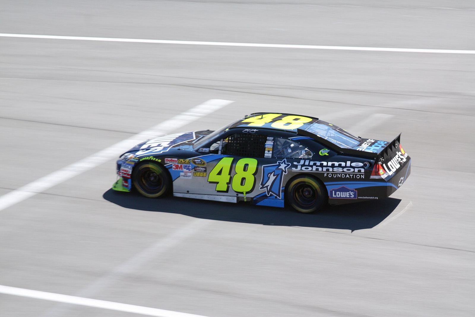 Jimmie Johnson's No. 48 Lowe's Chevrolet at speed at Auto Club Speedway