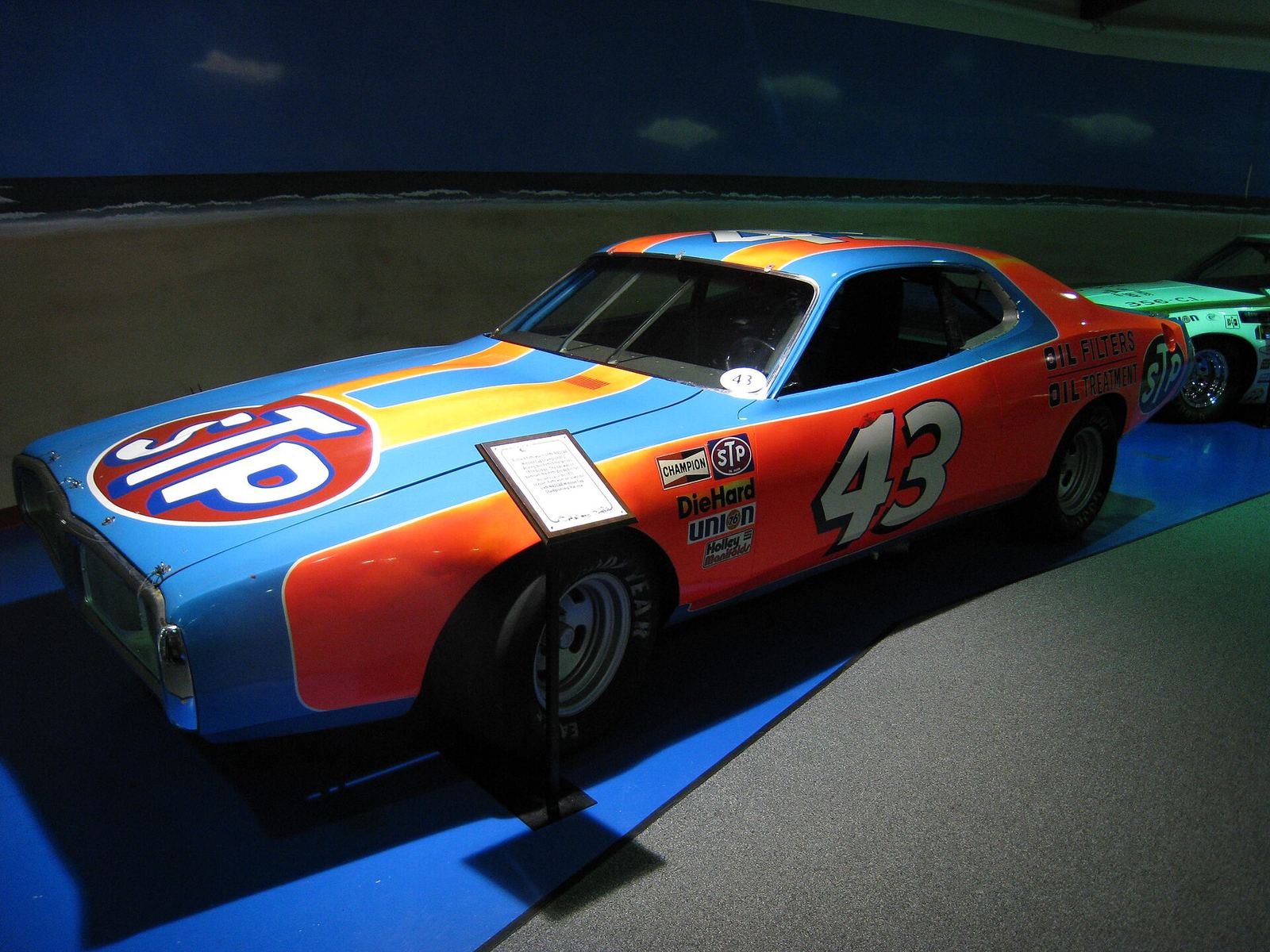 Richard Petty's red and blue No. 43 STP Dodge Charger on display